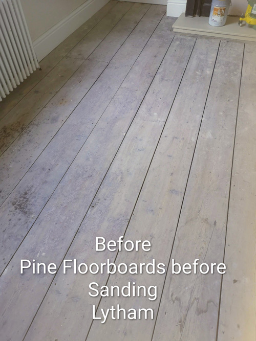Pine floorboards before sanding